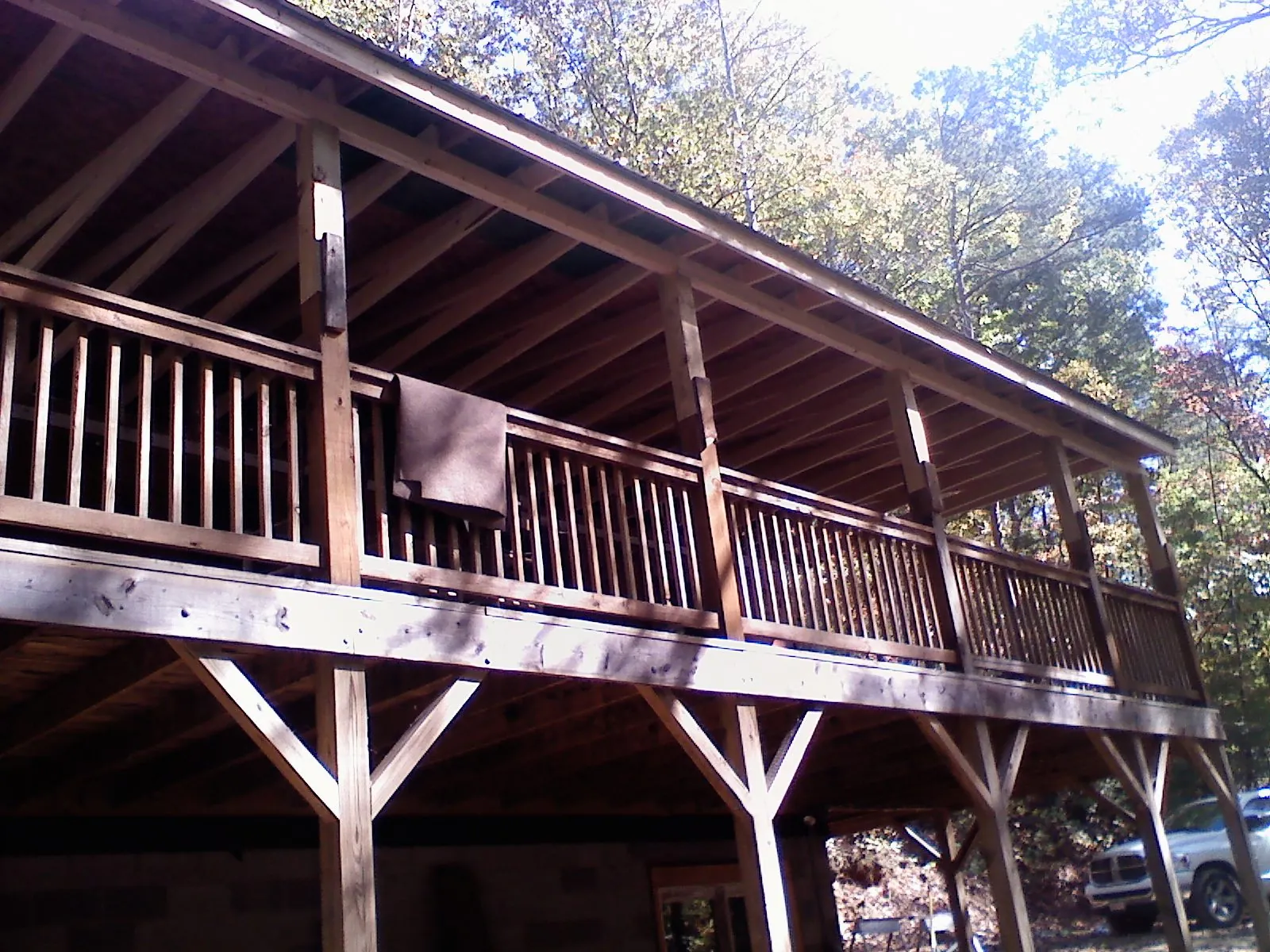 Timber framing under a new elevated porch and deck — Roof Leak Repair in Pipe Creek by Roofing Brothers